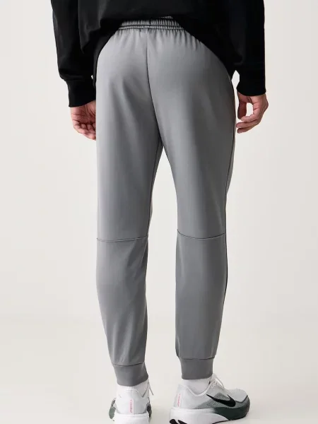 Nike spodnie treningowe Flex Therma-FIT szare