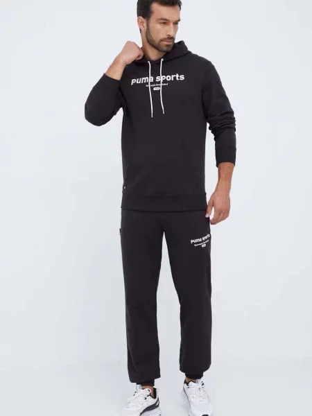 Bombažen pulover Puma s kapuco črna