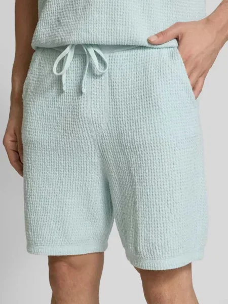 Szorty z dzianiny dresowej o kroju regular fit z fakturowanym wzorem model ‘Amoffle’ Boss Orange