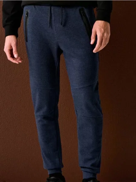 Sinsay Spodnie dresowe jogger granatowy