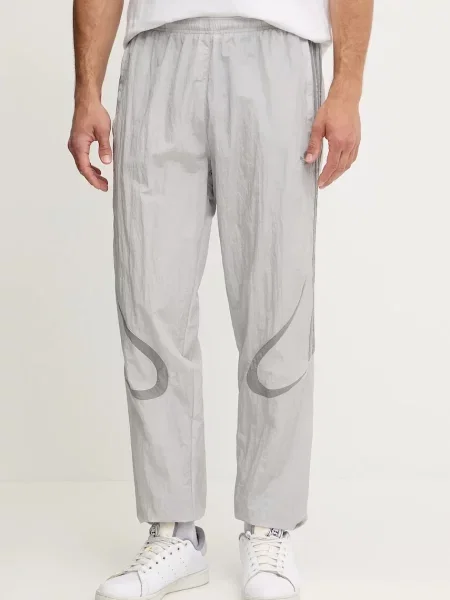 Tepláky adidas Originals s aplikací šedá