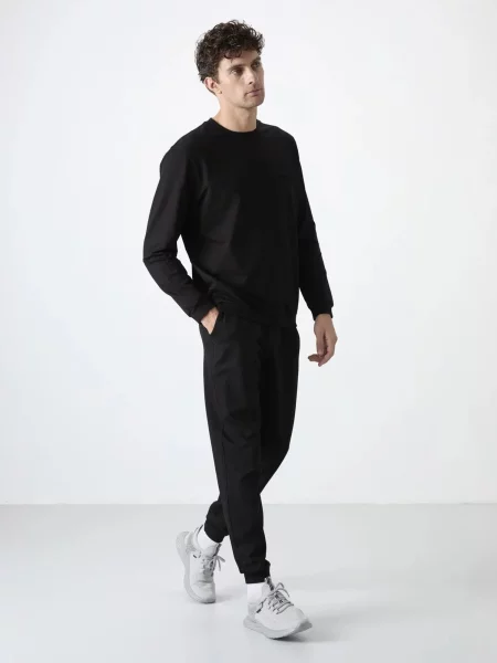 Tommy Life Trenirka za tek črna