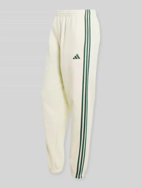 Spodnie dresowe o kroju regular fit z mieszanki bawełny Adidas Sportswear białe