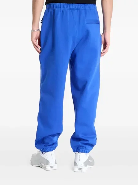 Pantaloni Nike din fleece alb