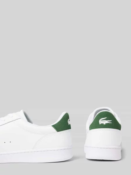 Sneakersy niskie ze skóry naturalnej Lacoste białe