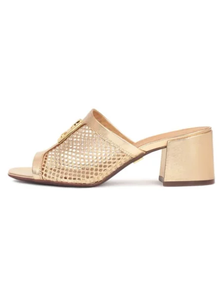 Openwork gold mules decorated with a monogram