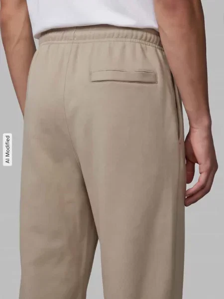 Spodnie dresowe w kroju regular fit z mieszanka bawełny Nike beżowe