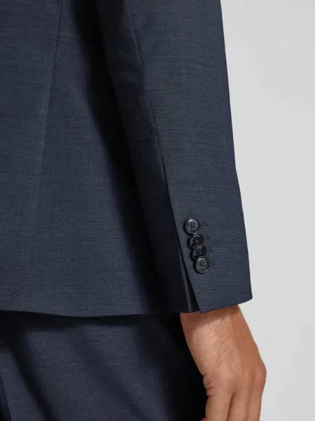 Marynarka do garnituru o kroju slim fit z mieszanki żywej wełny model ‘HUGE’ Boss granatowa