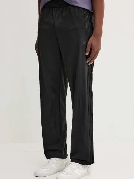 Спортивні штани adidas Originals Firebird з аплікацією чорний