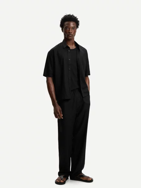 Bershka Spodnie Jogger Z Mieszanki Lnu Z Szerokimi Nogawkami Mężczyzna L czarny