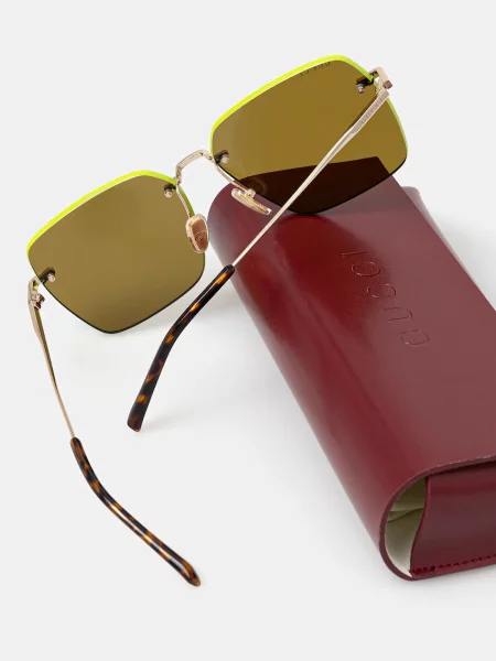 Солнцезащитные очки Gucci золотые