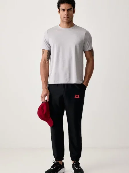 Under Armour trening hlače Tech Sport črna