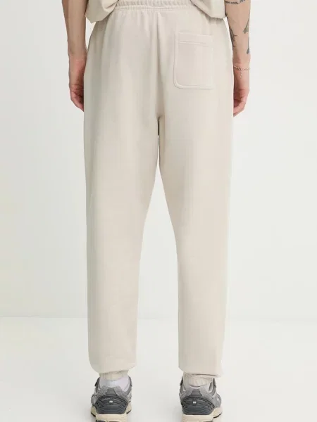 Tommy Jeans spodnie dresowe beżowy