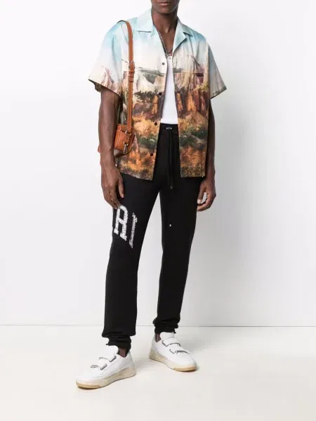 Spodnie Amiri z rozcieciem czarne Shopsy