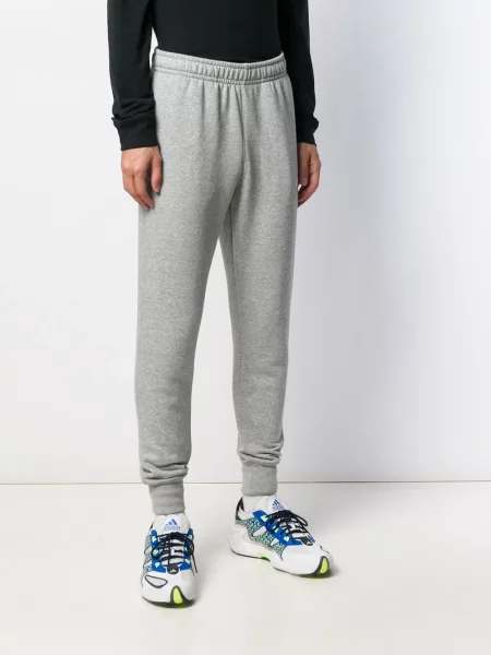 Fleecové běžecké kalhoty Nike šedé
