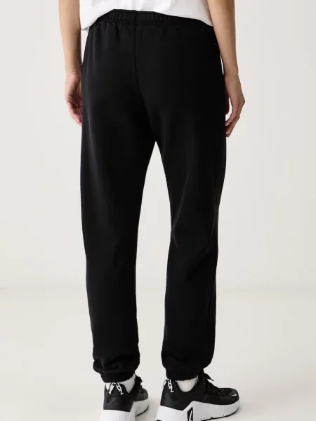 Női nadrág Nike Studio Fleece total black/sail. Méret: XS fekete