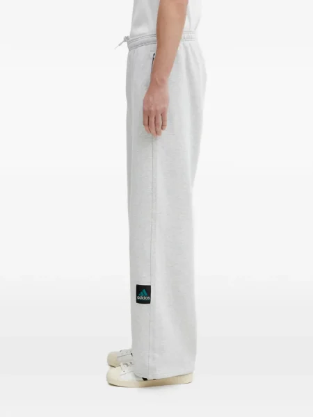 Sneakersy Adidas Predator w paski z dekoltem w serek z kapturem różowe