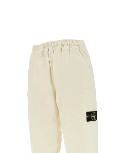 Pantaloni Stone Island cu strasuri