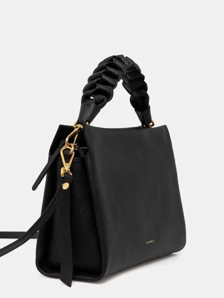 Шкіряна сумочка Coccinelle фіолетовий