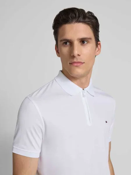Koszulka polo o kroju regular fit z mieszanki bawełny Tommy Hilfiger białe
