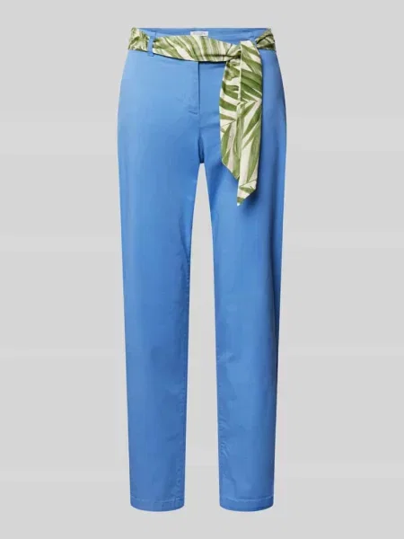 Chinosy o kroju slim fit z wiązanym paskiem Christian Berg Woman niebieskie