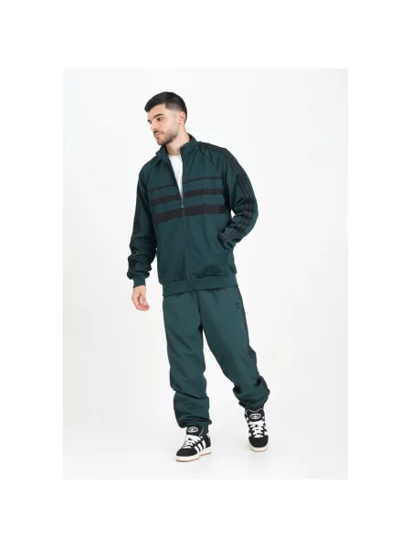 Adidas Spodnie dresowe adicolor Woven Firebird zielony