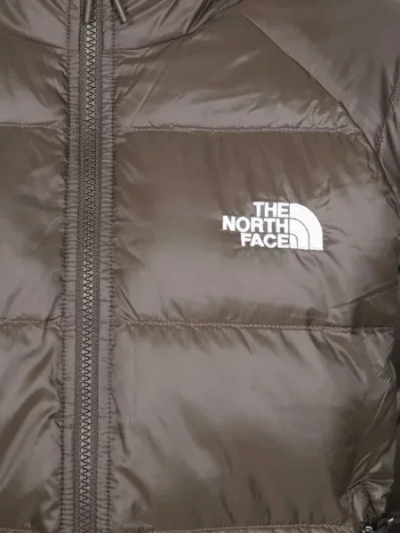 Péřová bunda The North Face hnědá
