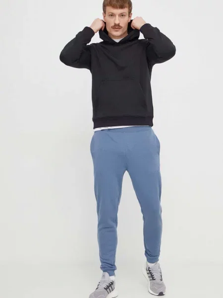 Pletené nohavice Calvin Klein Jeans modrá