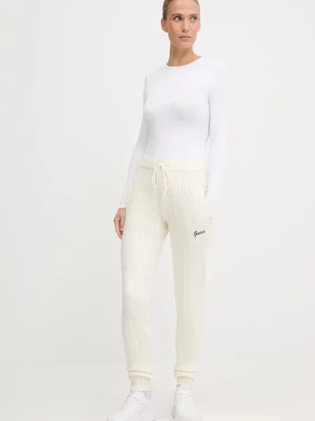 Однотонные спортивные штаны Guess бежевые
