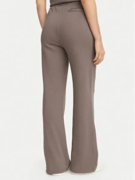 Calvin Klein Jeans Sportinės kelnės Monogram Tamsiai Flare Fit smėlinė
