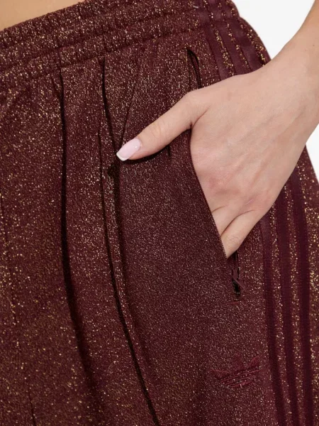 Prugasti prsluk Adidas od flisa s vezicama crvena