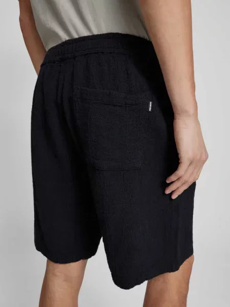Szorty o kroju relaxed fit z efektem marszczenia Review czarne