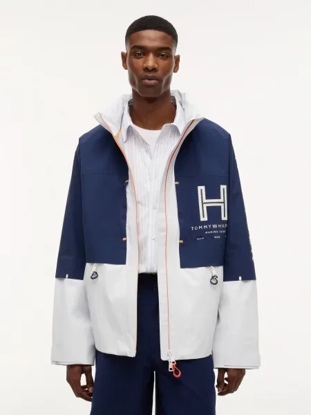 TOMMY HILFIGER Prechodná bunda námornícka modrá / tmavooranžová biela