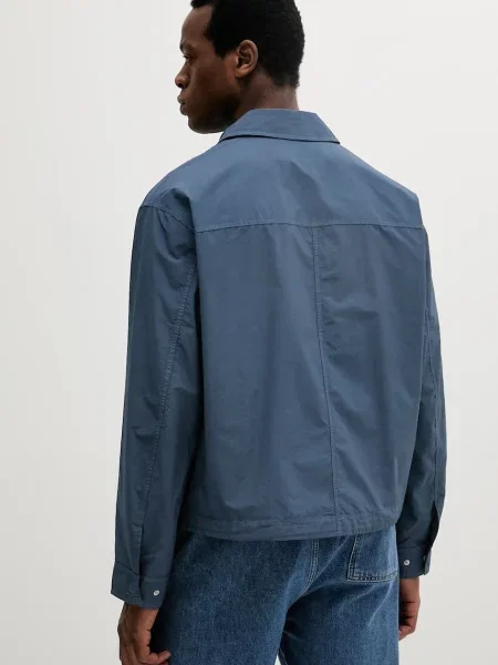 Bunda Calvin Klein Jeans přechodná oversize modrá