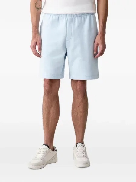 Pantaloni scurți Lacoste din fleece albastru