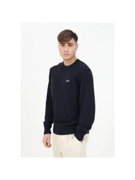 Bluza Lacoste wełniana z długim rękawem niebieska
