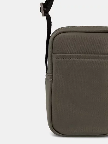 Calvin Klein Saszetka Sleek Slim Reporter zielony