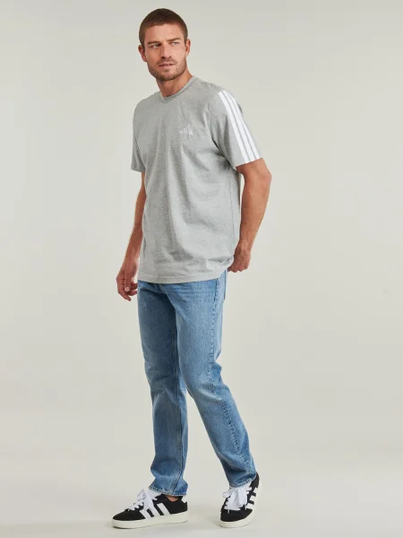 Pruhované tričko Adidas sivá