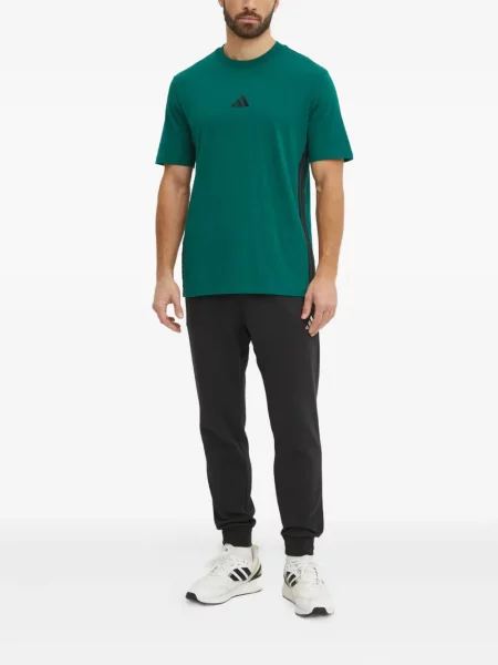 Kalhoty Adidas s potiskem šedé