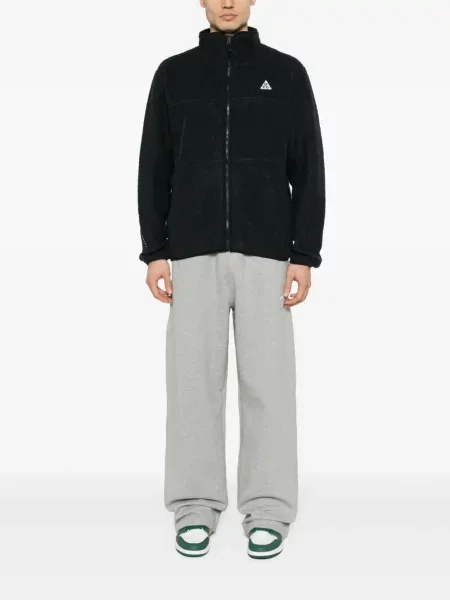 Zúžené kalhoty Nike černé