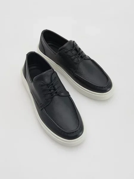 Кожаные кеды Reserved черные