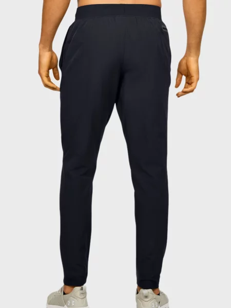 Стрейчевые зауженные брюки Under Armour черные