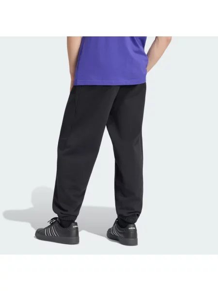 SPODNIE O STANDARDOWYM KROJU Z MAŁYM LOGO I MANKIETAMI ADIDAS KIT czarne
