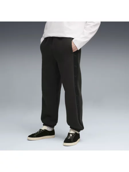 PUMA spodnie dresowe T7 Odzież S czarny