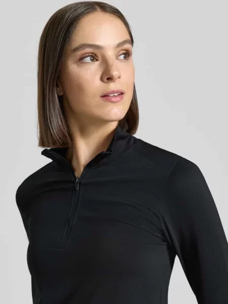 Bluzka z długim rękawem o kroju slim fit z kołnierzem zapinanym model FEATHER' Fabletics czarna