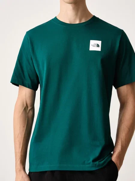 The North Face футболка з бавовною Evolution