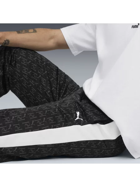 PUMA spodnie dresowe T7 o luźnym kroju z nadrukiem na całej powierzchni Akcesoria S czarny