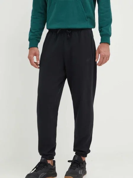 New Balance pantaloni de trening din neted negru