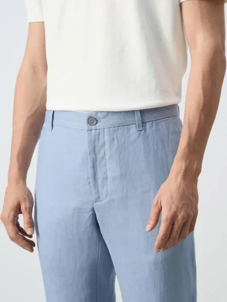 Spodnie slim fit z lnu Mężczyzna 38 MANGO MAN błękitny