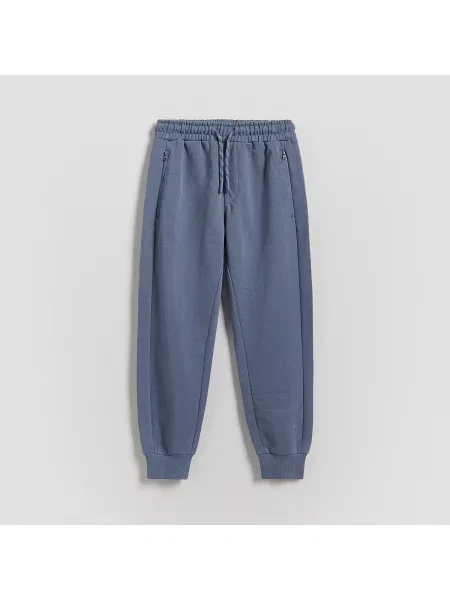 Reserved kalhoty joggers modrá